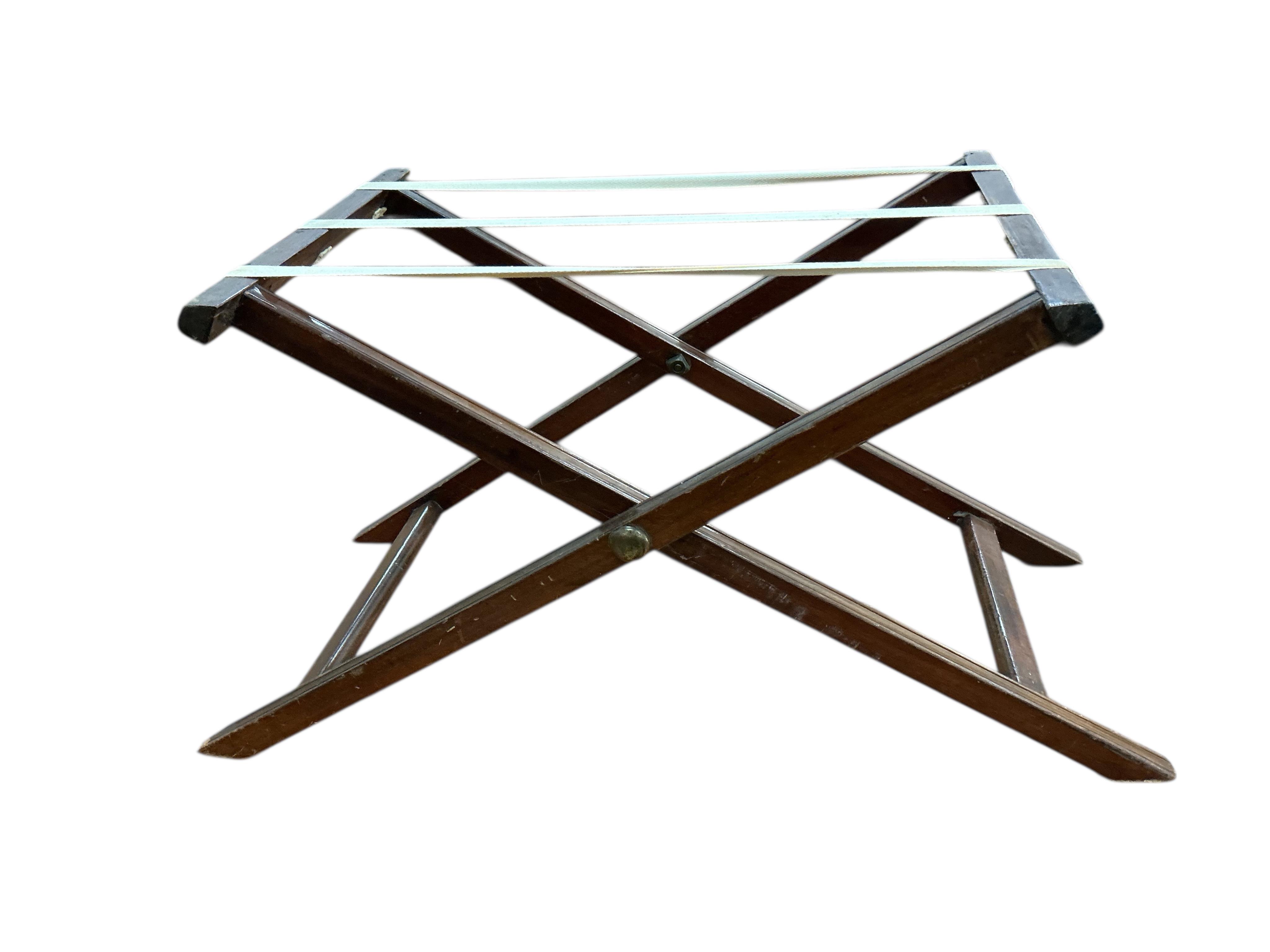 A George III style oval mahogany butler's tray on folding stand, width 70cm, depth 42cm, height 52cm